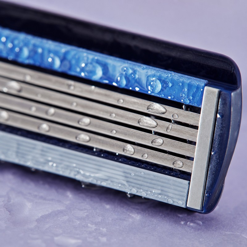 Razor cutting body hair at the skin surface